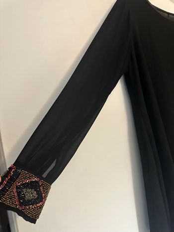 Jolie haut légèrement évasée taille unique