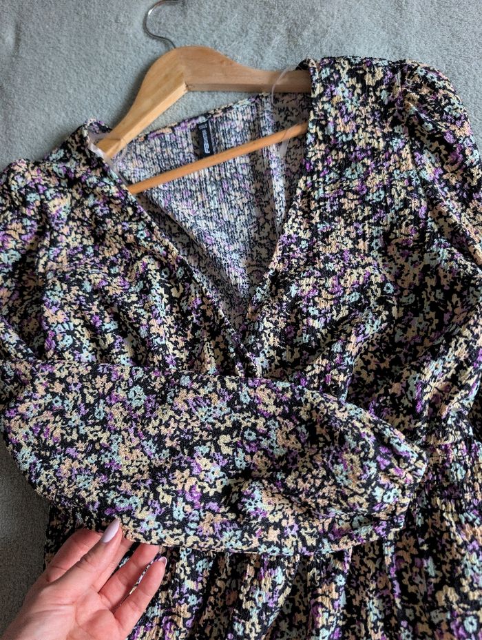 Blouse à manches longues péplum cache-cœur fleurie bohème chic tendance Taille 38 M
Très bon état - photo numéro 7