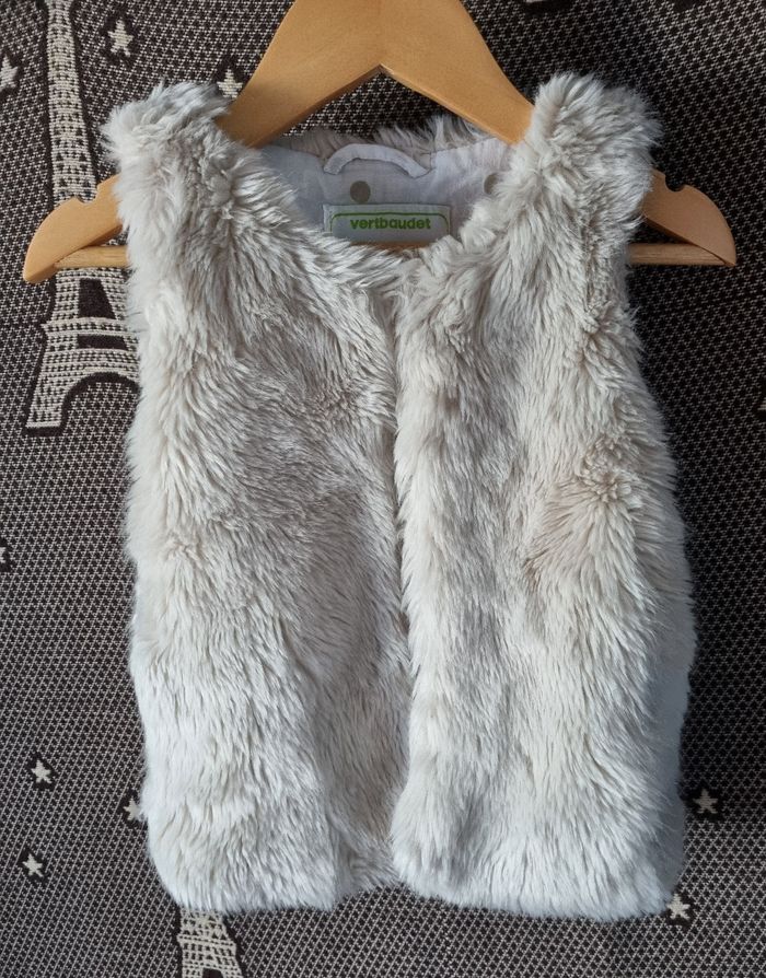 Veste sans manches fausse fourrure crème 3ans