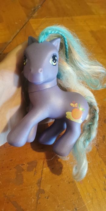 Petit poney violet abricot