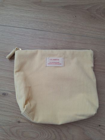 Clarins pochette neuve en velours avec fermeture éclair