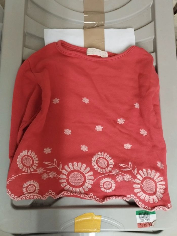 Pull rouge fleurie blanc 4ans