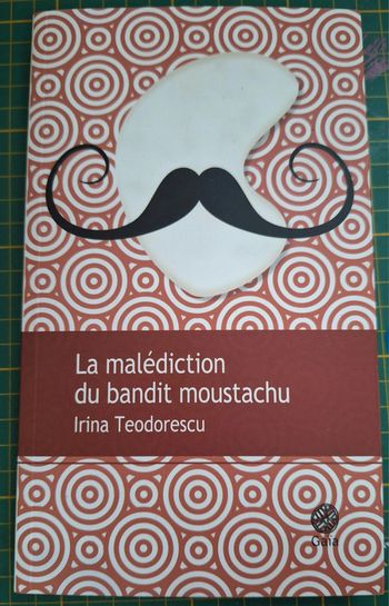 Livre "la malédiction du bandit moustachu" en très bon état