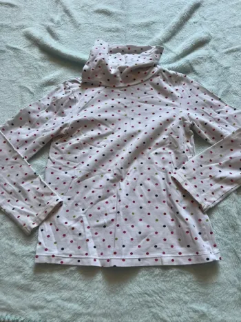 Pull coll roulé a poids