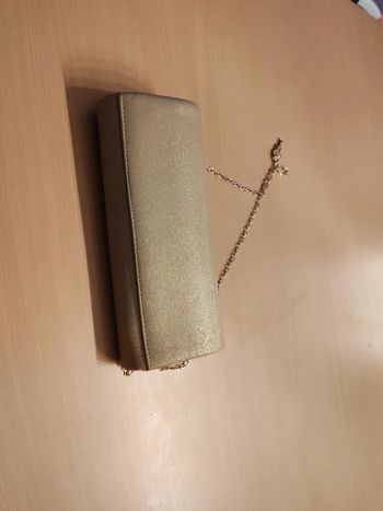 Sacoche pochette doré neuve excellent etat