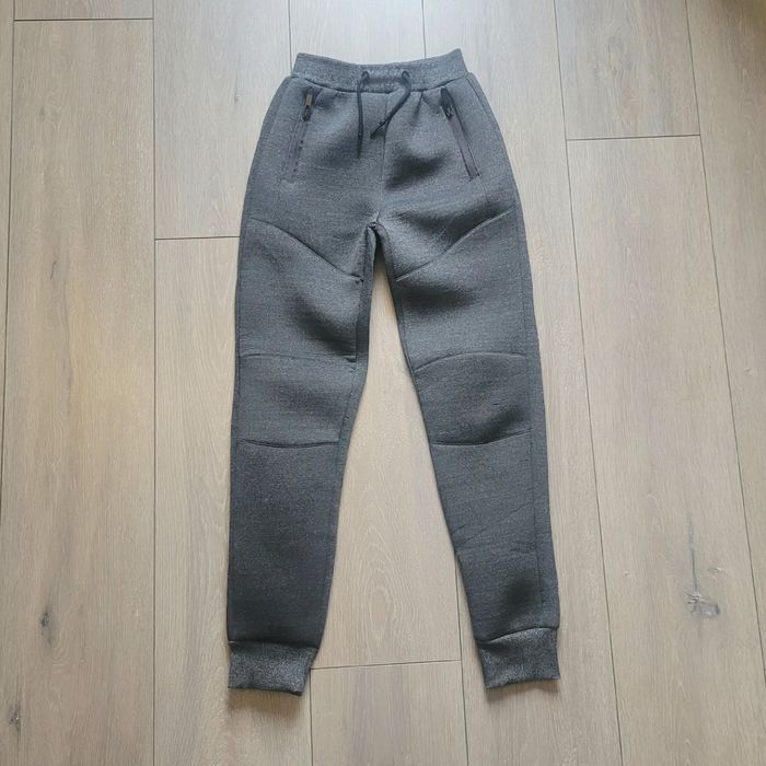 Joggins gris habillé/class. Garçon 10 ans. Marque Npo junior