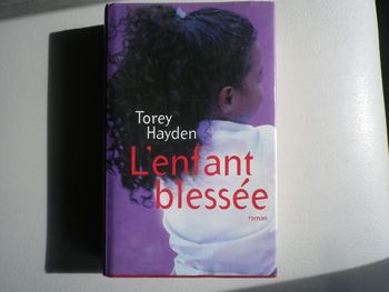 L'ENFANT BLESSEE