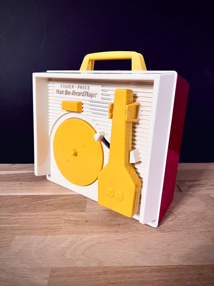 Tourne-disque jouet Fisher-Price Music Box Record Player réédition batterie avec 5 disques - Très bon état