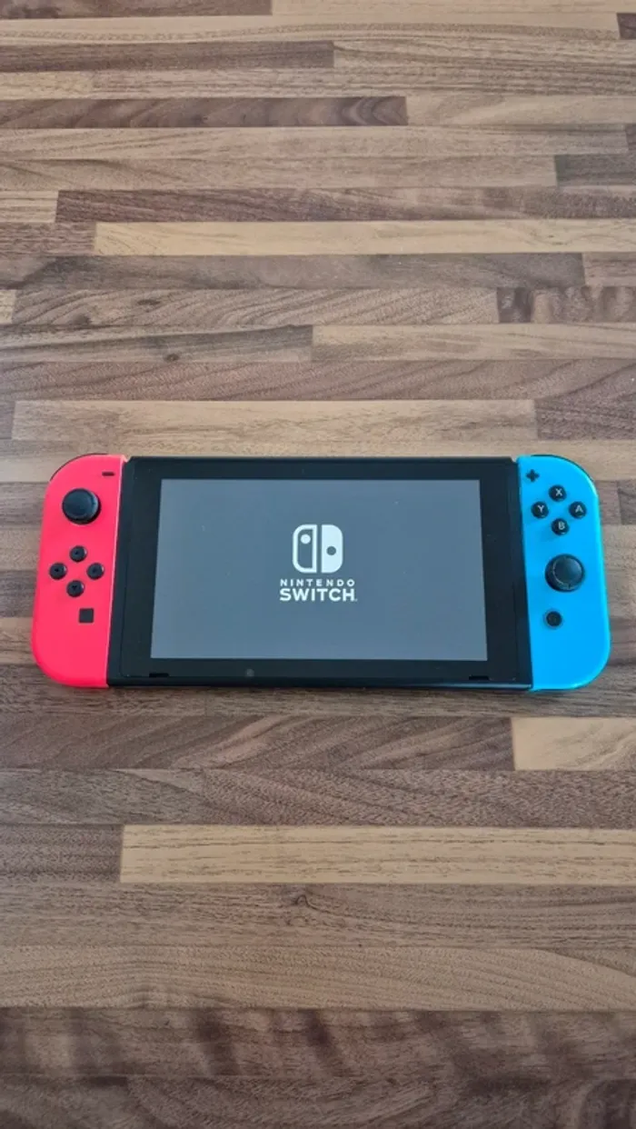 Console Nintendo switch en boîte - photo numéro 8