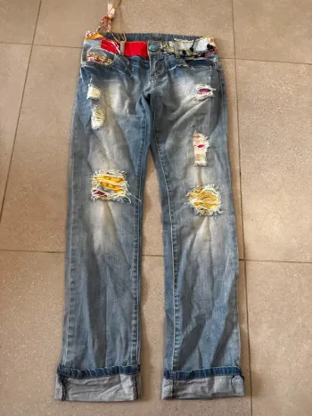 Jean multicolore Desigual, très bon état , taille 36 38x95cm