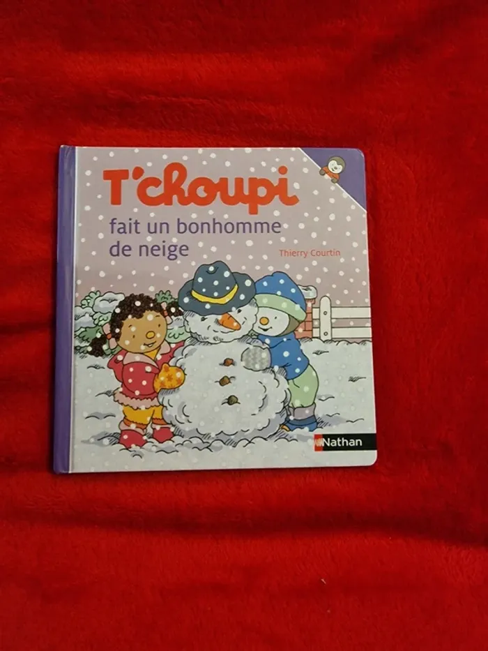Livre 12 t'choupi fait un bonhomme de neige