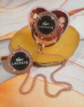 Tétine Lacoste rose gold