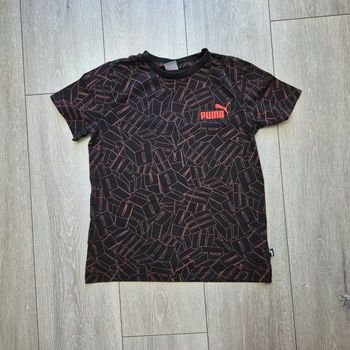 Maillot noir et orange. Garçon 10 ans. Marque Puma