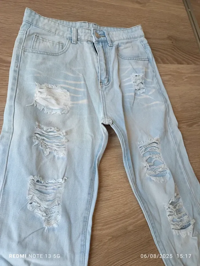 Magnifique jean a troue romwe taille 40 - photo numéro 2