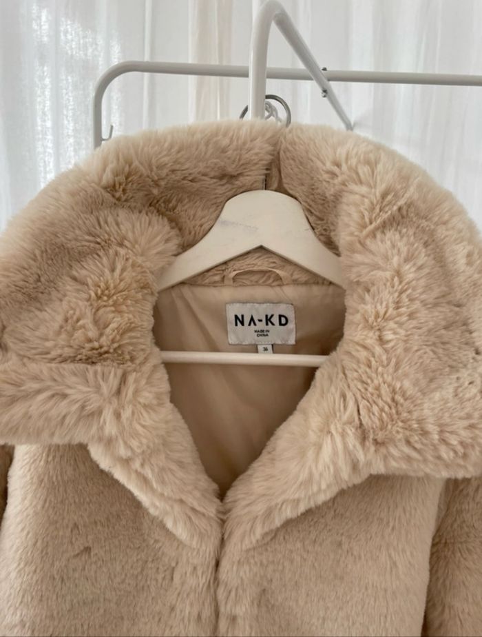 Manteau court fausse fourrure Beige