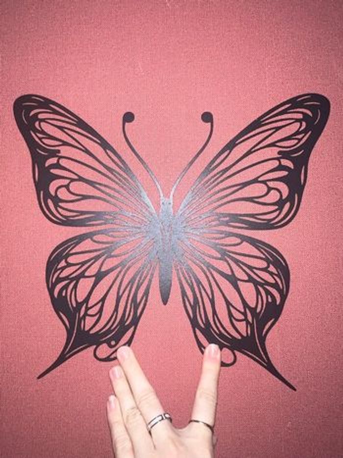 Décoration murale en métal papillon