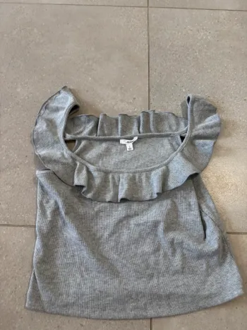 Haut gris Ardene, neuf, taille L valeur 17,5$