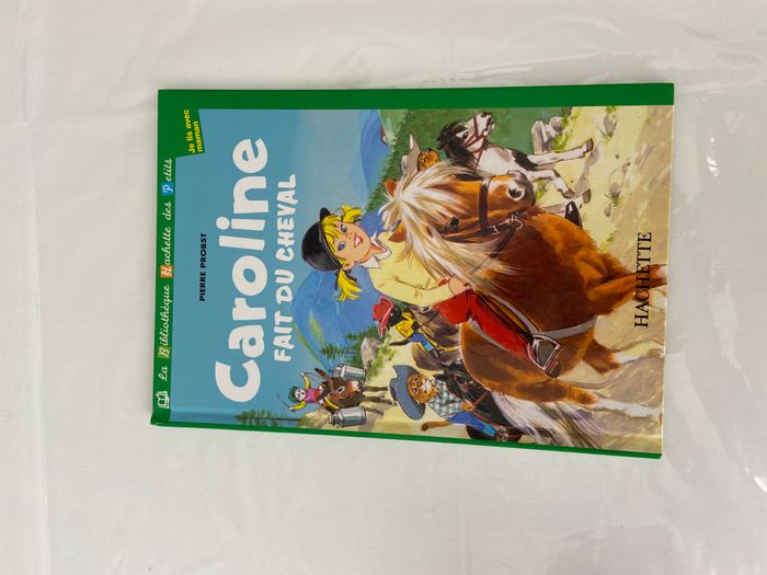 Livre Caroline fait du cheval