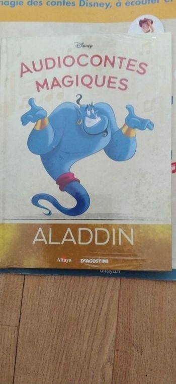 Livre Aladin + figurine le génie neuf 18€