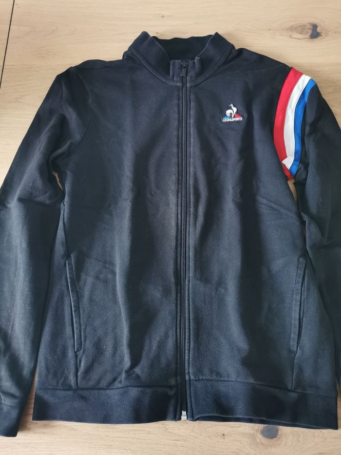 Gilet zippé noir sans capuche le coq sportif 14 ans en bon état