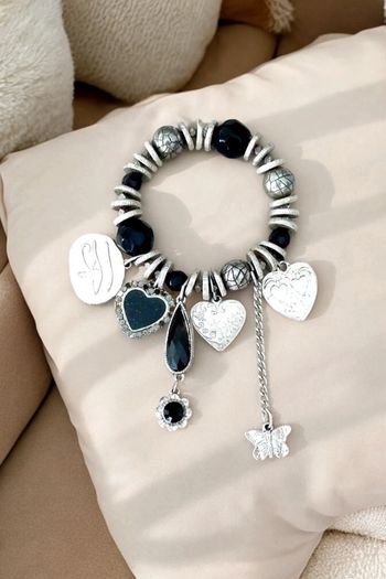 Magnifique bracelet breloque style vintage