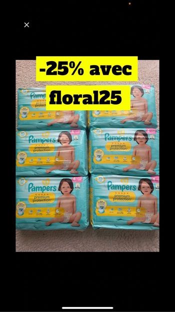 Six paquets de couches Pampers taille 4