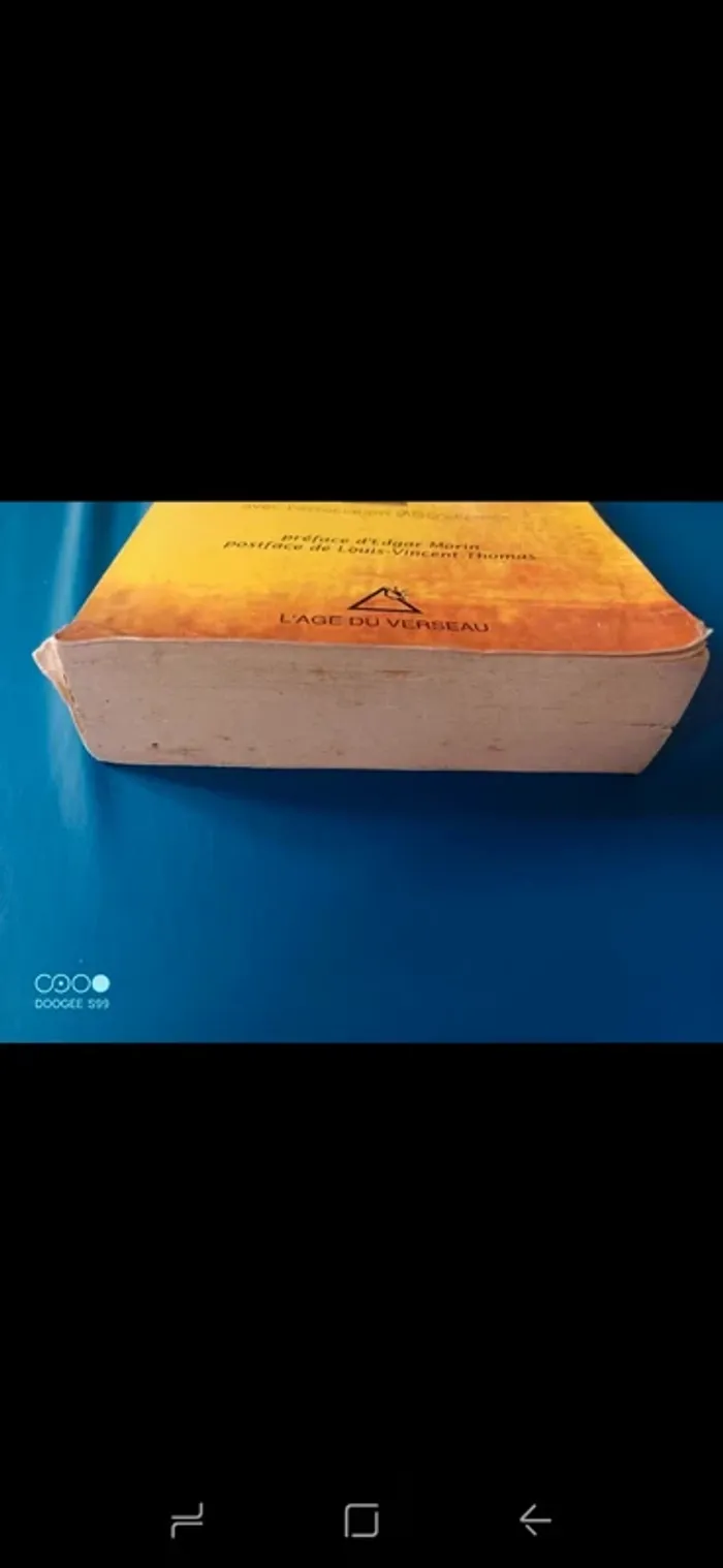 Livre abîmé - photo numéro 2