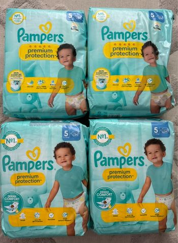 4 paquets de couches Pampers taille 5