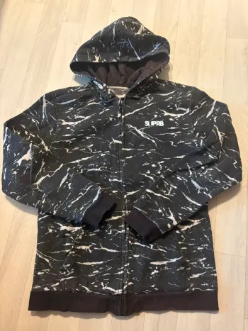 Sweat h&m 10/12 ans noir et blanc zippé et à capuche très bon état