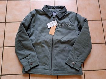 Veste mi saison taille 10 ans neuve 