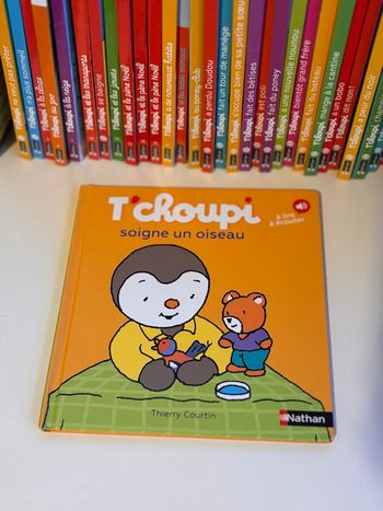 Livre tchoupi soigne un oiseau 