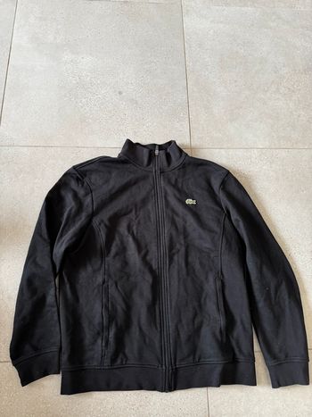 Gilet noir lacoste taille L pour femme, très bon état