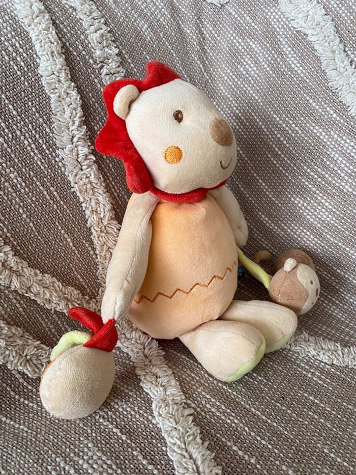 Peluche doudou 29cm sucre d’orge lion orange et rouge très bon état - photo numéro 2