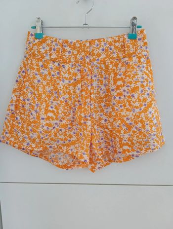 Short à fleurs orange 
Pimkie taille XS