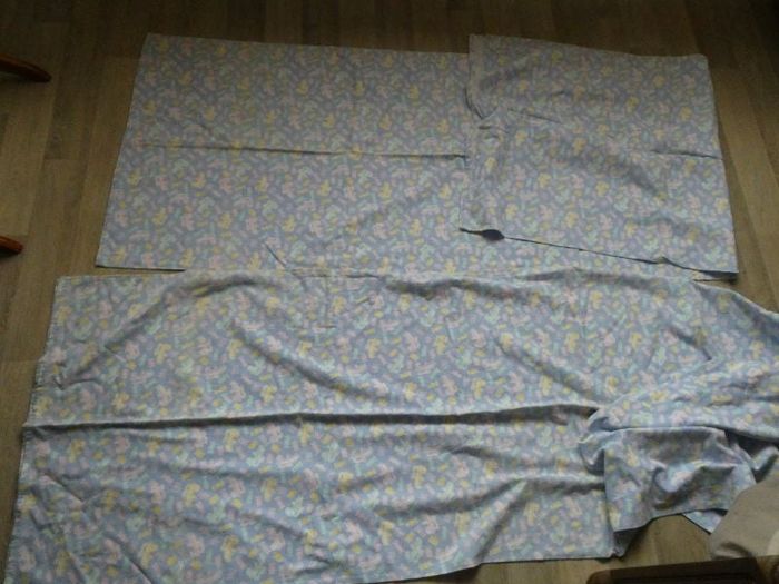 2 draps flanelle motif "bonbons" pour lit bébé