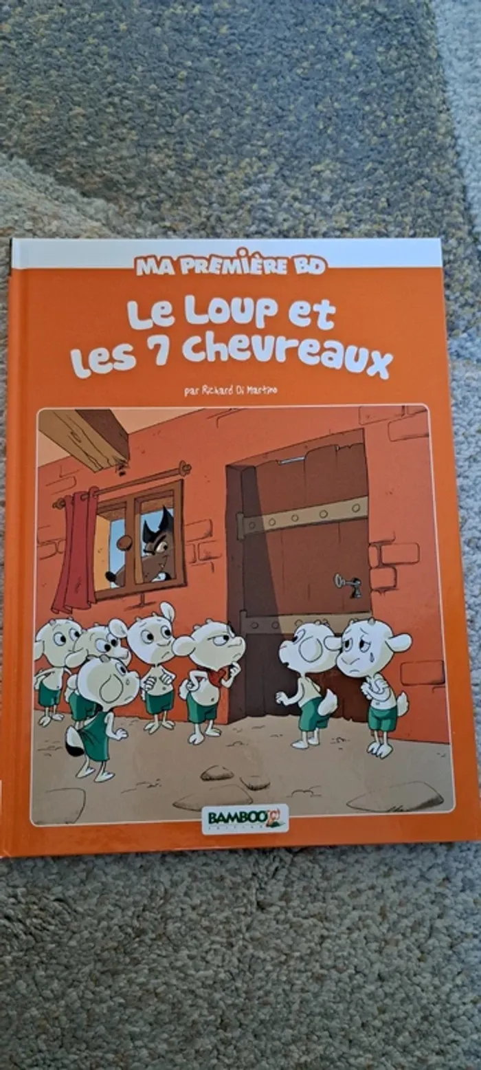 Livre 1ere BD, le loup et les 7 chevraux
