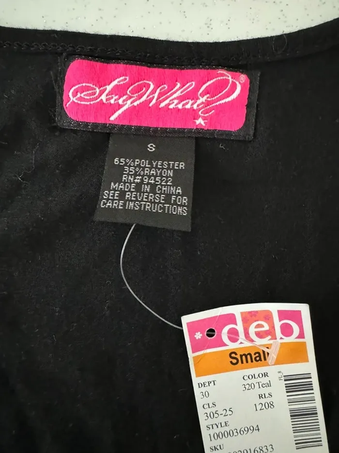 Top ou t shirt sans manche - photo numéro 2