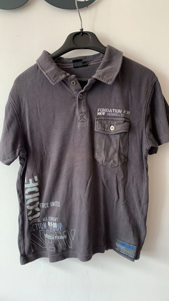 Polo gris foncé 12 ans