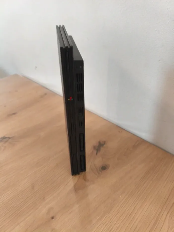 Ps2 slim lire l'annonce - photo numéro 2
