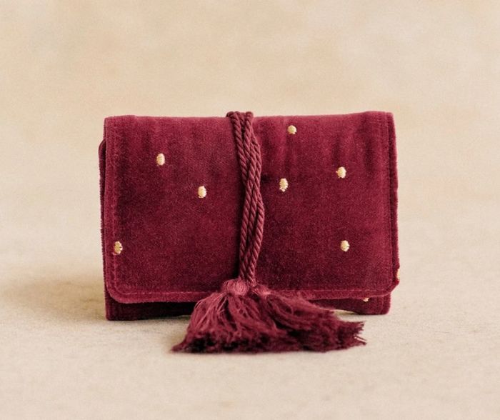Mini pochette bijoux bordeaux à pois dorés