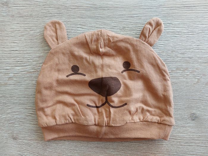 Bonnet bébé Langue au chat marron ours