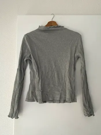 Pull col roulé