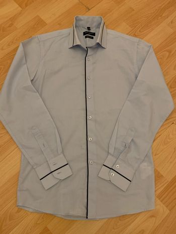 Jolie chemise bleu ciel taille 37/38