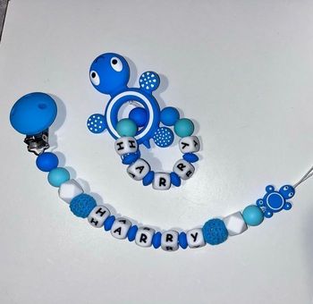 Ensemble attache tétine