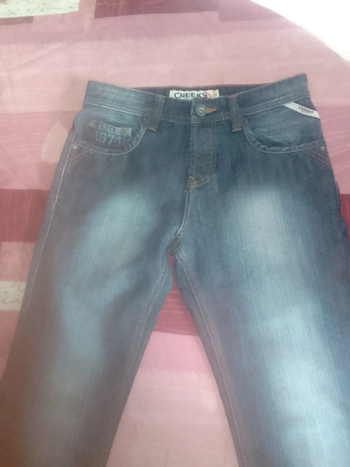 Jean pour hommes couleur bleu taille 36 marque Creeks.