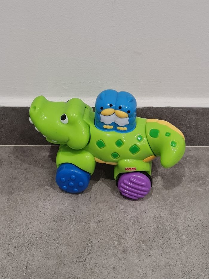 Alligator press & go fisher price