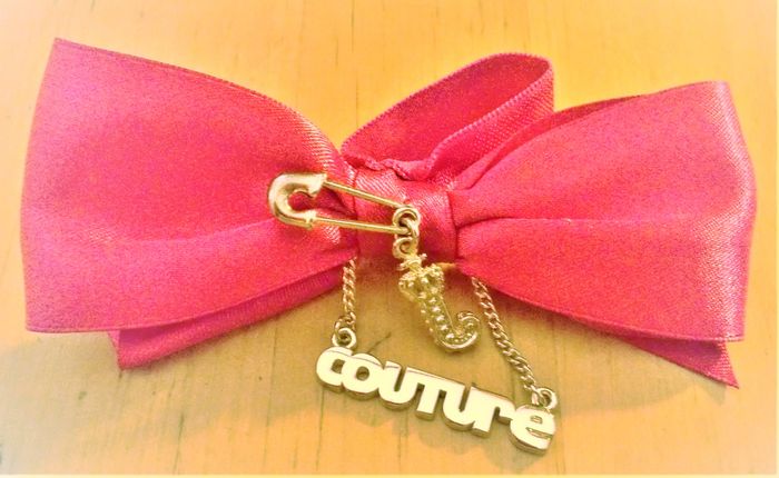 Broche "Juicy Couture"