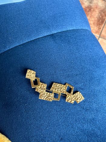broche doré