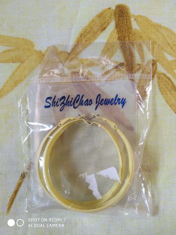 Boucles oreilles neuves anneaux jaunes neuf