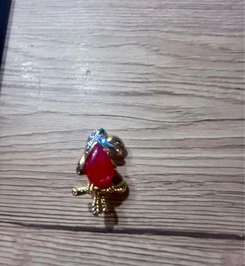 Broche toucan yeux verts